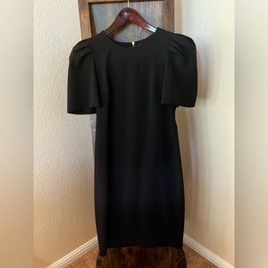 Calvin Klein Black formal dress. Knee length. Sleeves. Size 8 Women’s.